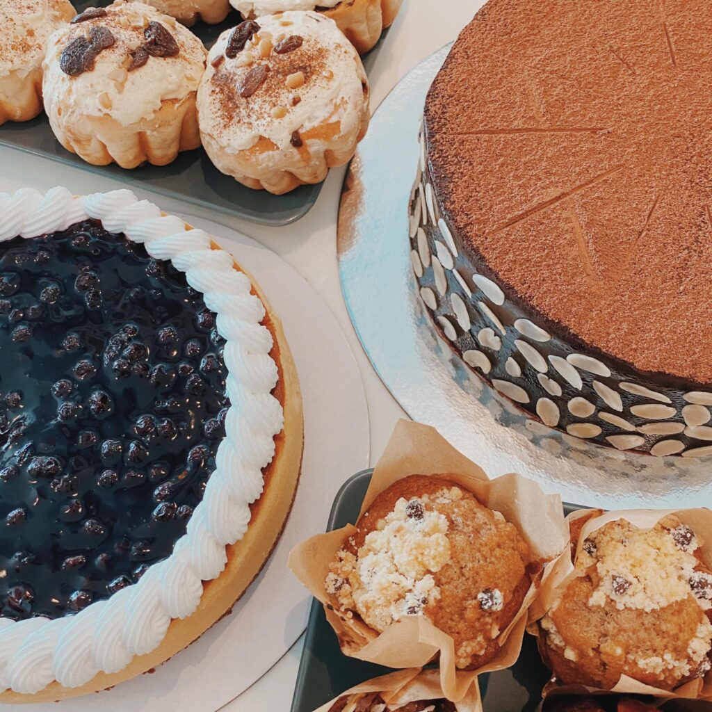 photo of cakes and pastries offered by the best coffee shop nearby, daily grind coffee shop