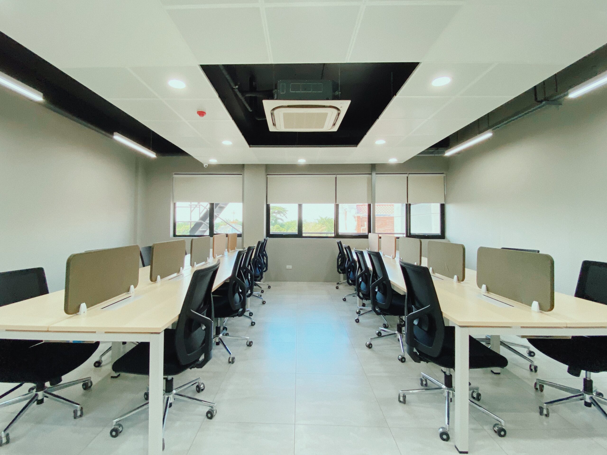 Dedicated desks in a conducive working environment at a coworking space