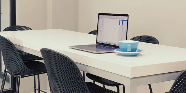 flexible desk in daily grind coffee shop and coworking space